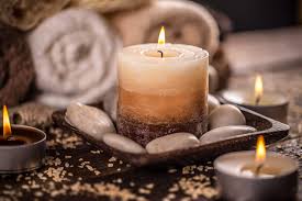 Natural soy scented candles burning in a relaxing setting at Owl Creek Candles